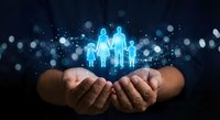 Hands holding glowing family silhouettes with digital particles, representing protection, care and insurance concepts for business presentations.