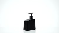 Black geometric soap dispenser with pump on white background for modern bathroom and kitchen design projects.