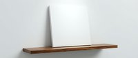 Minimalist wooden floating shelf mounted on white wall with clean modern design for home decor and storage solutions in contemporary interior spaces.