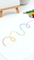 Rainbow dotted wavy line drawing on white paper with colored pencils and a small wooden easel, creative art activity for kids education.