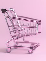 Chrome shopping cart on pink background with soft shadows and reflections. Minimalist retail concept for e-commerce and online shopping designs.