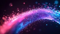 Magical glowing wave with sparkling particles in pink and blue colors creating dynamic motion effect against dark background. Abstract light trail design.