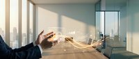 Businessman hands creating digital network connections with glowing light effects in modern office space with city skyline view through windows.