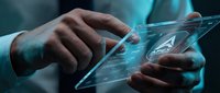 Businessman using transparent futuristic tablet with holographic interface and digital icons for modern technology and innovation concepts.