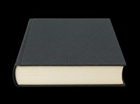Closed book with dark gray hardcover and cream pages, isolated on transparent background, ready for clipart, t-shirt design, print-on-demand products, stickers, and sublimation projects.