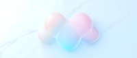Soft pastel cloud shapes in pink and blue tones floating on marble background, creating dreamy abstract composition for modern design projects.
