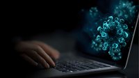 Glowing virus cell on laptop screen with hand typing on keyboard in dark room, medical research and technology concept for healthcare presentations.