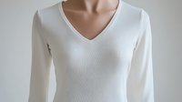 White v-neck ribbed sweater on mannequin torso against light background, classic minimalist knitwear design for fashion retail and catalog styling.