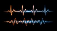 Glowing heartbeat pulse waveforms with orange to blue gradient on black background for medical technology designs.