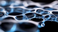 Macro photography of soap bubbles forming delicate interconnected structures with blue lighting effect creating abstract organic patterns and textures on dark background.