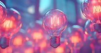 Vintage filament light bulbs with glowing elements against blurred colorful background, creating atmospheric mood for interior design.