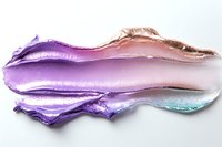 Colorful makeup smears with purple, pink and turquoise eyeshadow creating artistic texture on white background for cosmetic and beauty design projects.