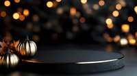 Metallic pumpkins and star anise on dark stone platform against blurred golden bokeh lights background, moody autumn seasonal composition.