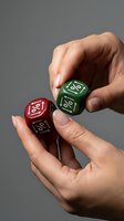Hands holding red and green percentage dice showing discount symbols for sales promotion and marketing campaigns on gray background.