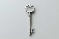 Vintage silver skeleton key isolated on light gray background, featuring ornate bow design and classic ward cuts. Symbolic object for security and access.