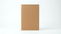 Minimalist brown kraft paper notebook with blank cover isolated on white background for branding mockup and stationery design projects.