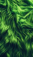 Vibrant green faux fur texture with long flowing strands creates dynamic movement pattern. Luxurious synthetic material background for fashion and design projects.