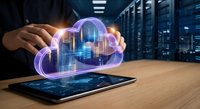 Hands protecting glowing cloud computing hologram above tablet in modern data center server room for digital transformation and technology solutions.