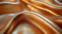 Luxurious golden silk fabric with flowing waves and soft highlights creating elegant textile background for fashion and design projects.