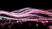 Pink glowing particles forming dynamic wave pattern against dark background, abstract light trails with bokeh effect and sparkling dots in motion.