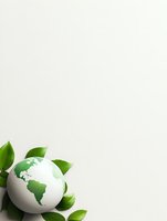 Green and white globe with fresh leaves on light background, environmental concept for sustainability and eco-friendly business solutions.