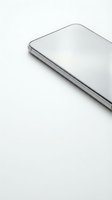 Modern silver laptop computer closed on clean white background with minimalist design and sleek metallic finish for technology and business concepts.