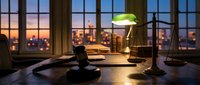 Lawyer office desk with gavel and scales of justice at sunset. Legal consultation workspace with law books and banker lamp for attorney services.