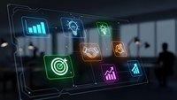 Futuristic holographic interface with glowing business icons displaying analytics, innovation and technology concepts in modern office environment.