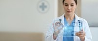 Young female doctor examining digital holographic medical data and x-ray images in modern healthcare facility using advanced technology for patient diagnosis.