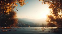 Golden autumn sunset view through forest frame with fallen leaves on wooden surface and mountain silhouette in misty background.