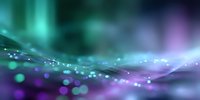 Dreamy abstract background with blurred turquoise and purple bokeh lights, flowing energy waves and glowing particles creating magical atmosphere. For modern design projects.