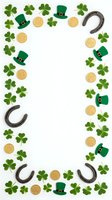 St. Patrick's Day frame with shamrocks, leprechaun hats, gold coins and horseshoes on white background for festive greeting cards and party invitations.