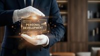 Personal development concept with businessman in formal attire holding glowing golden box with text, symbolizing growth, self-improvement, and career advancement for business and motivational use.