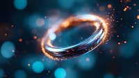 Glowing energy ring with orange and blue light effects against dark background, sparkling particles creating magical atmosphere. For fantasy and sci-fi designs.