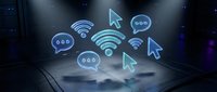 Digital communication icons floating above laptop keyboard with wifi signals, chat bubbles and cursor symbols representing online connectivity and networking.