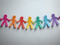 Colorful paper cutout figures holding hands in rainbow sequence on white background. Symbol of unity, diversity, and community.