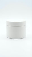 Blank white cylindrical container with lid isolated on white background, ready for cosmetics, skincare, cream, or product packaging design mockups.