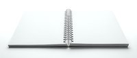 Open spiral notebook with blank pages on white background, ready for writing, planning, and design projects.