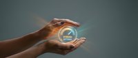 Stream optimal concept with hand holding glowing digital sphere icon against gray background. Use for technology, streaming services, digital optimization, and business solutions marketing.