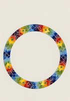 Colorful geometric circular frame with vibrant rainbow pattern featuring stars and diamonds, isolated on neutral background, ready for design projects, invitations, and decorative applications.
