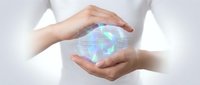 Hands protecting holographic Earth globe with digital network connections, symbolizing environmental protection and global technology innovation.
