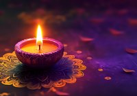 Lit decorative candle in ornate holder placed on golden mandala pattern against purple background with scattered petals, suitable for wellness, spirituality, and meditation design projects.