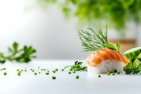 Fresh salmon nigiri sushi with rice, dill and cucumber on white background, garnished with green herbs and microgreens, close up view with copy space.