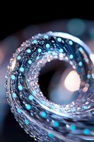 Swirling abstract wave pattern with glowing blue dots and sparkling bokeh effects against dark background, creating magical spiral movement and light play.