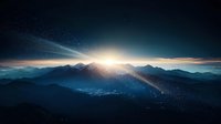 Dramatic sunrise over misty mountain peaks with sunburst and starry sky creating ethereal atmosphere. Layered mountain silhouettes fade into blue hazy horizon.