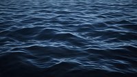 Dark moody ocean waves with deep blue rippling water surface texture creating dramatic natural pattern in low light conditions for atmospheric backgrounds.