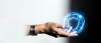 Businessman hand holding glowing digital sphere with blue energy light effect, representing technology, innovation, and future business solutions.