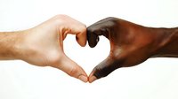 Diverse hands forming heart shape against white background, representing unity, love, racial harmony and togetherness. Powerful symbol of acceptance and equality.