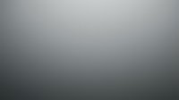 Smooth gradient background transitioning from light gray to dark charcoal, suitable for overlays, web design, and digital projects.