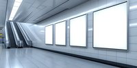 Empty subway station corridor with escalator and four blank white billboards on wall. Modern minimalist underground passage with fluorescent lighting.